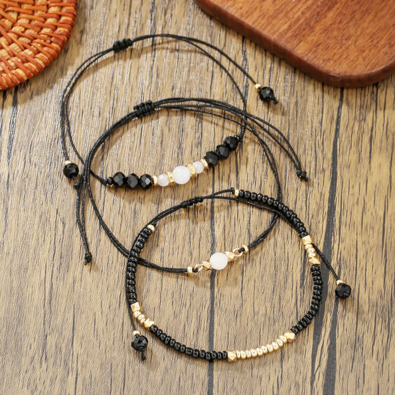 Set de Pulseras Bolitas Negro y Dorado 1E7