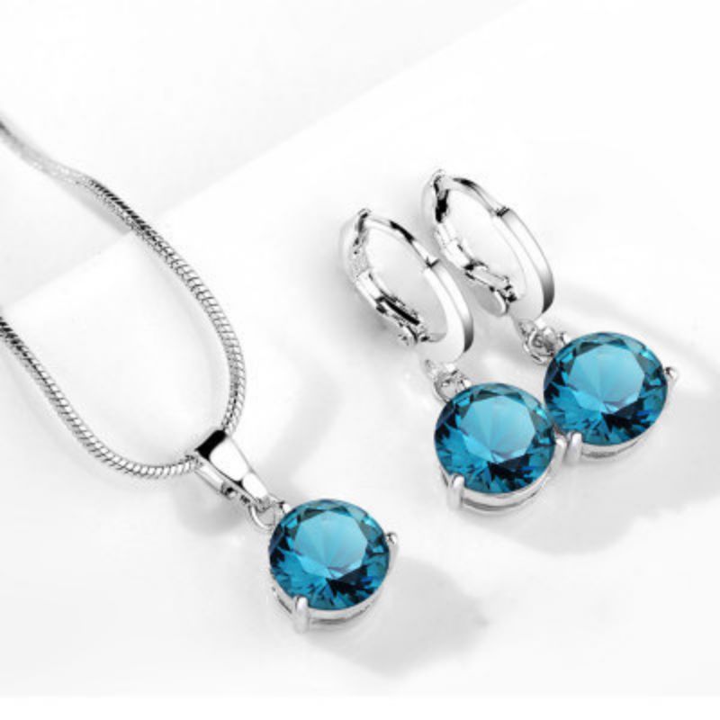 Collar y Aretes Cristal Azul Chapa de Oro 3L5