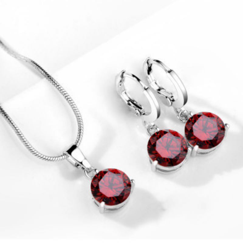 Collar y Aretes Cristal Rojo Chapa de Oro 1T2