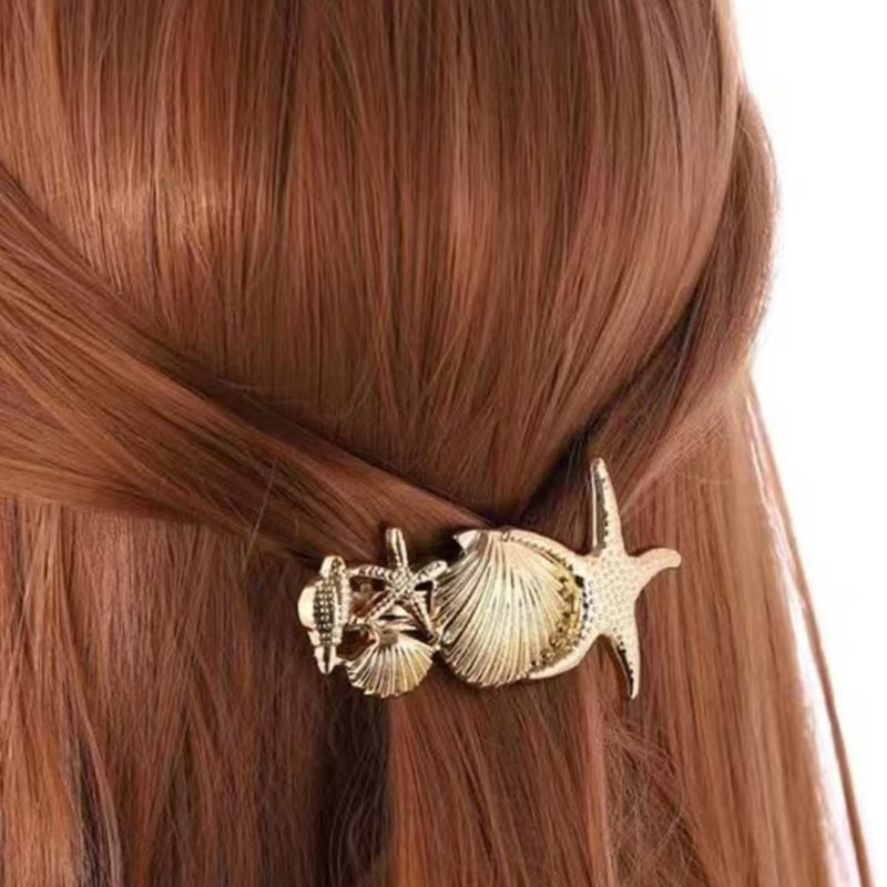 Clip Pinza Concha con Estrella de Mar 2H1