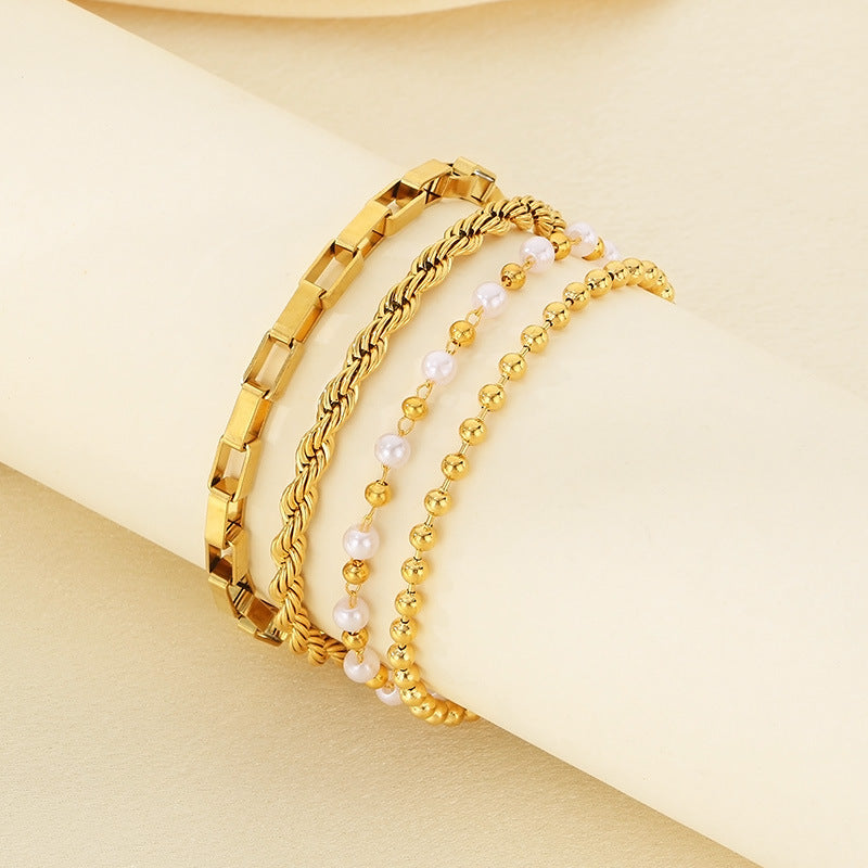 Set Pulseras 4pzs Doradas Perlitas Acero Inoxidable 1Z2