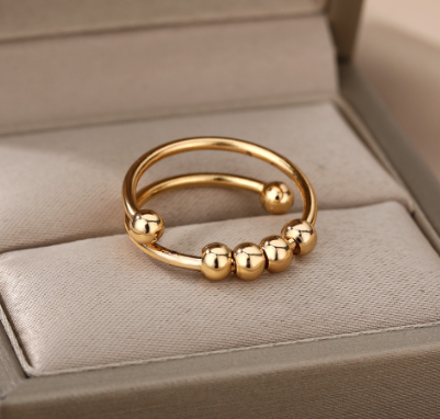 Anillo Dorado Anti-Ansiedad Bolitas Gira