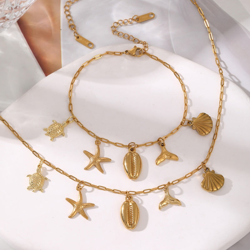 Collar y Pulsera Charms Concha Dorado Acero Inoxidable 1J1