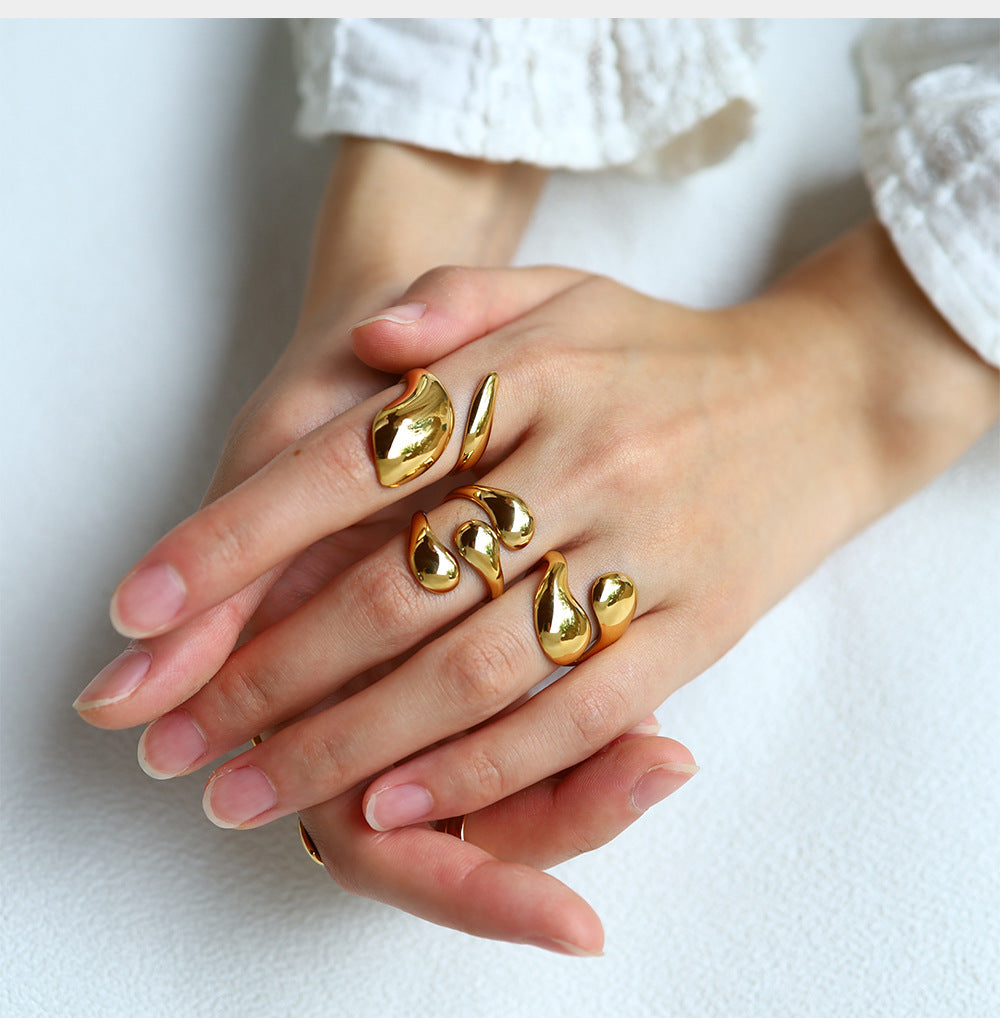 Anillo Gotas Encontradas Doradas Acero Inoxidable 1L5