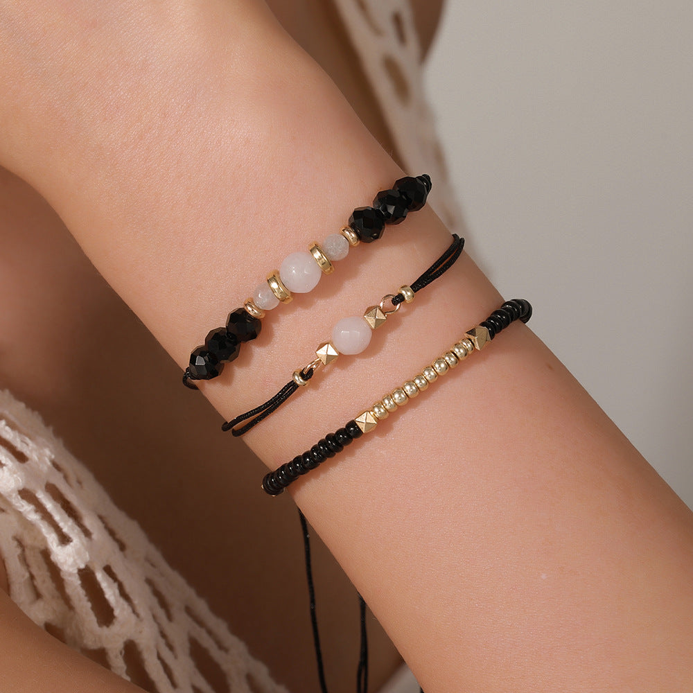 Set de Pulseras Bolitas Negro y Dorado 1E7