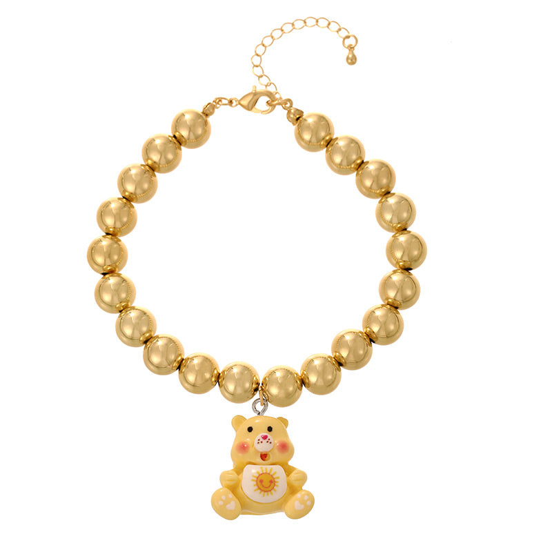 Pulsera Dorada Bolas y Oso Amarillo  2P4