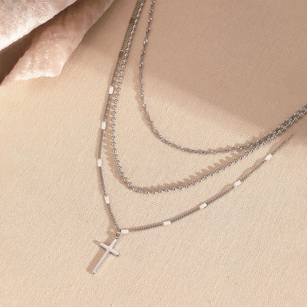 Collar Layer Plateado  con Cruz 3i5