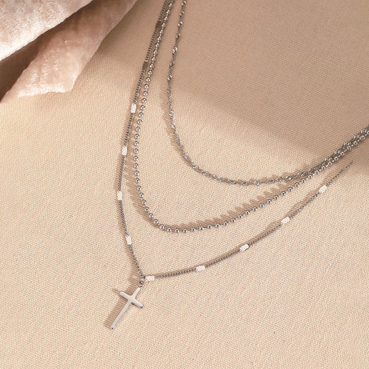 Collar Layer Plateado  con Cruz 3i5