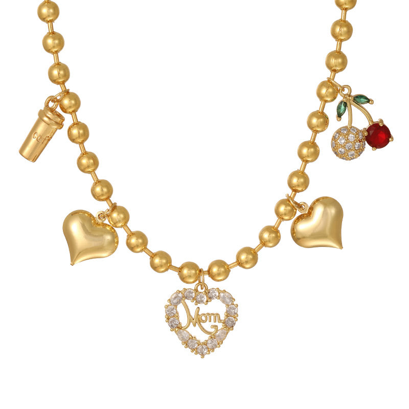 Collar Dorado Bolitas y Charms