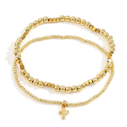 Pulseras Bolitas Doradas y Cruz  2pz 1S6