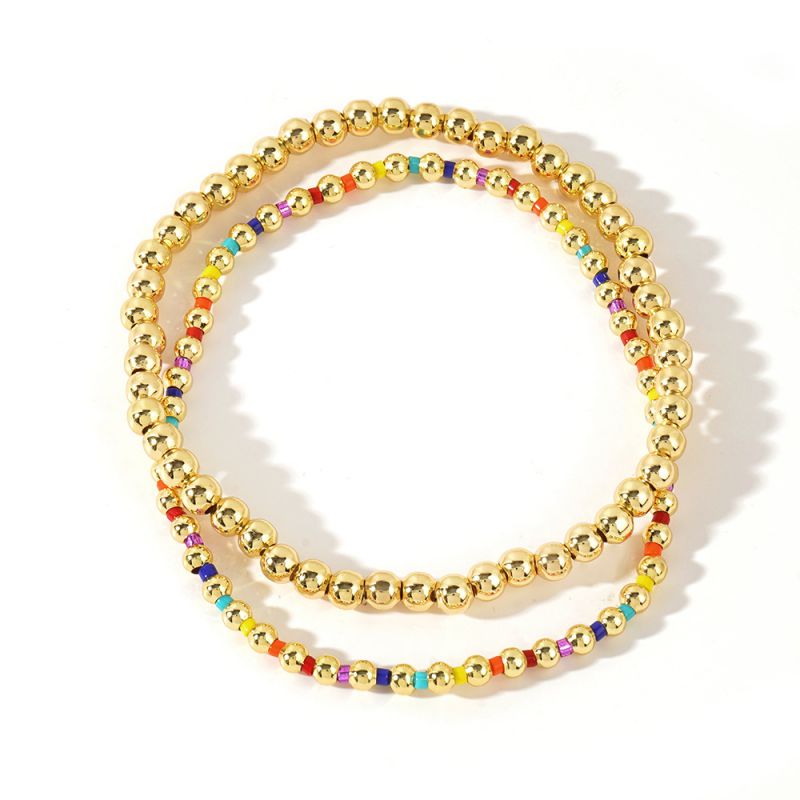 Pulseras Bolitas Doradas y Colores  2pz 1X5