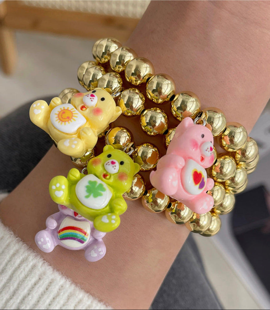 Pulsera Dorada Bolas y Oso Rosa  2Y5