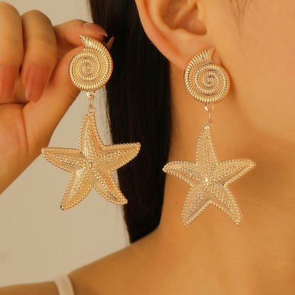 Aretes Estrella Caracol Dorados 1Q6