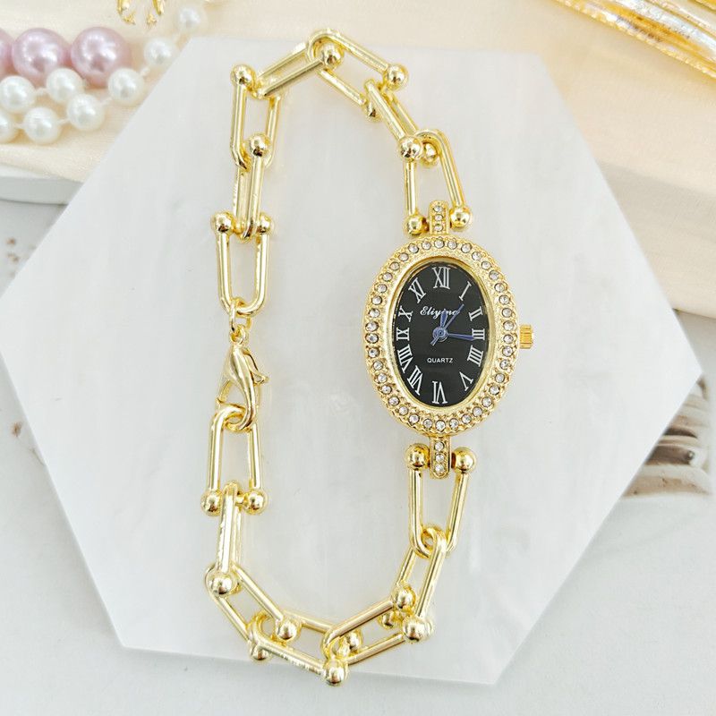 Reloj Dorado Pulsera Negra Carátula de Zirconias 4E42