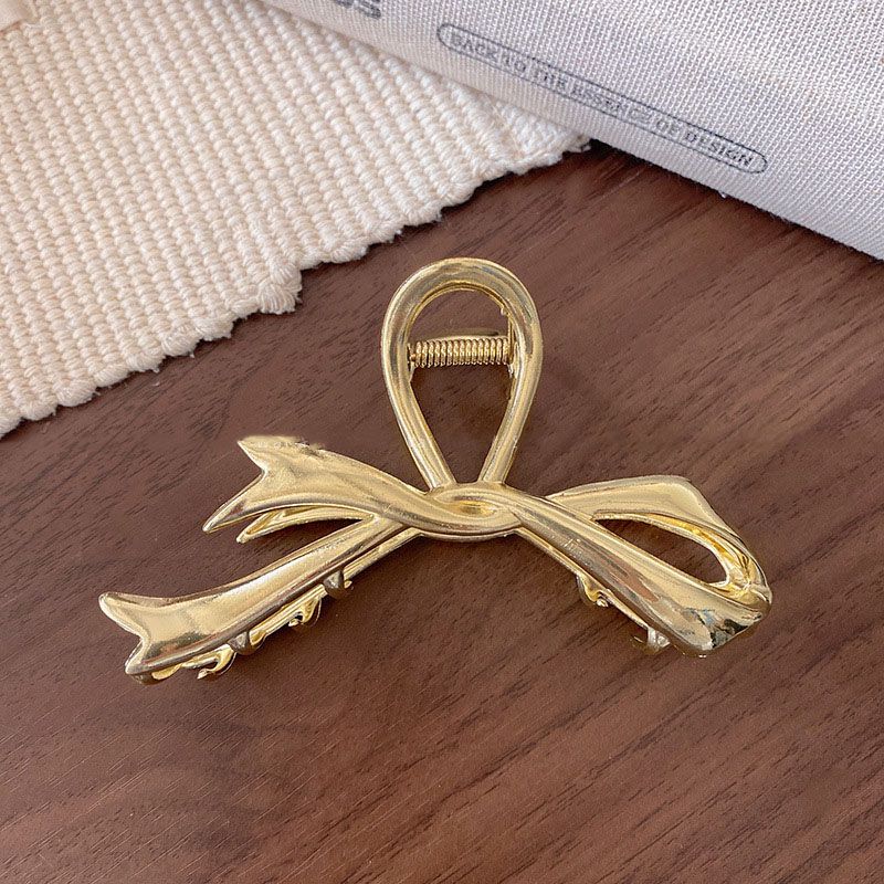 Pinza para Pelo Dorado Metálico