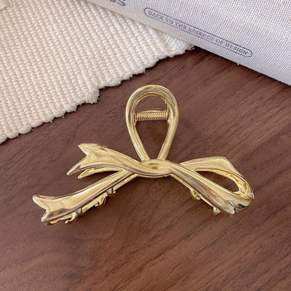 Pinza para Pelo Dorado Metálico