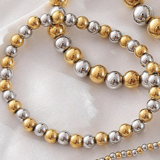 Pulsera Cuentas Esféricas Oro-Plata   2M4