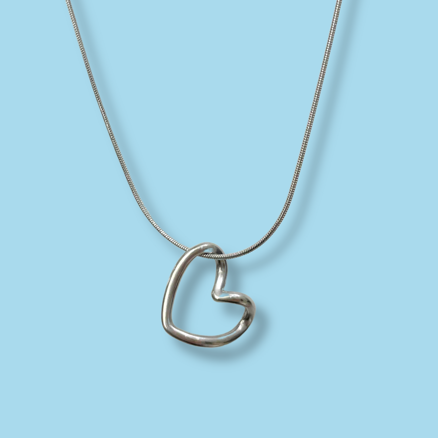 Collar Plateado Corazón Enlazado Acero Inoxidable  1M5