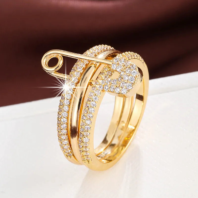 Anillo Dorado Tres en Uno Zirconias T7 Chapa de Oro  Ve2