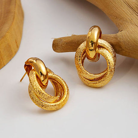 Aretes Aros Dorados Nudo de Aros  1S3