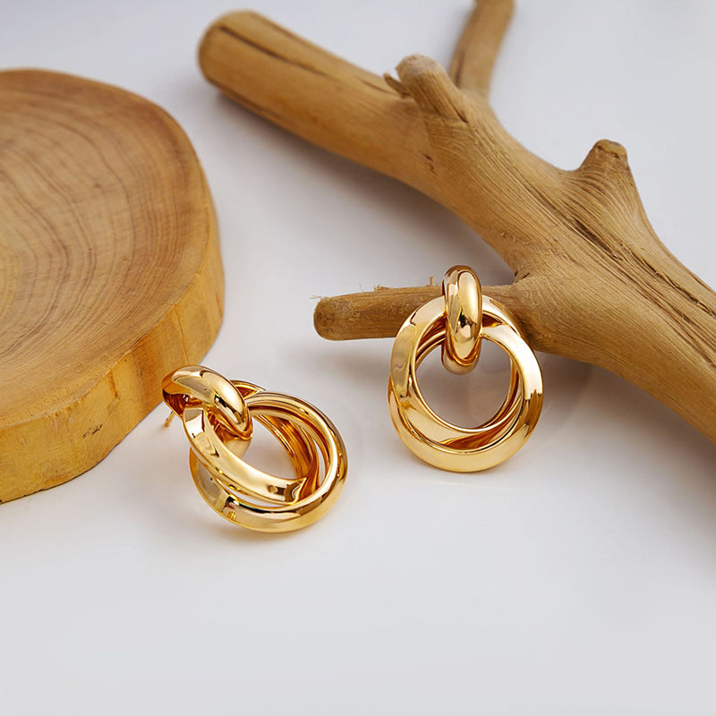Aretes Dorados Aros Nudo  1T5