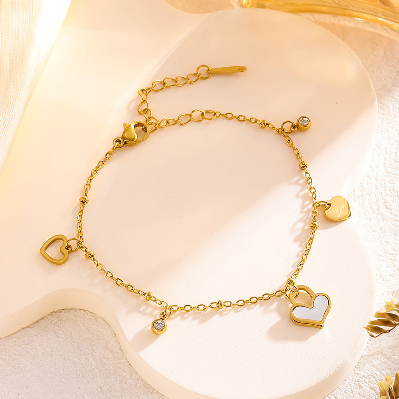Pulsera Dorada Corazones Acero de Titanio