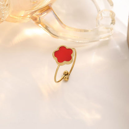 Anillo Dorado Trebol Rojo Acero de Titanio