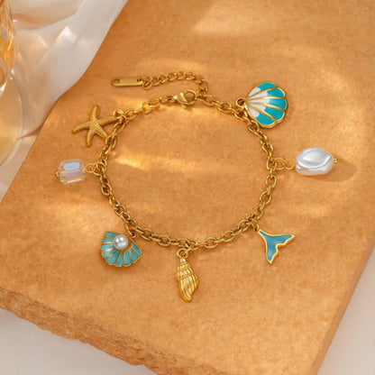 Pulsera Dorada y Azúl Charms Verano  Acero Inoxidable C617