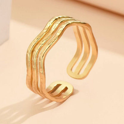 Anillo Dorado Ondas Acero Inoxidable  2V4