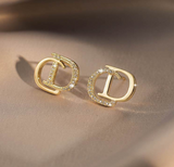 Aretes CD Dorados Brillante   LU