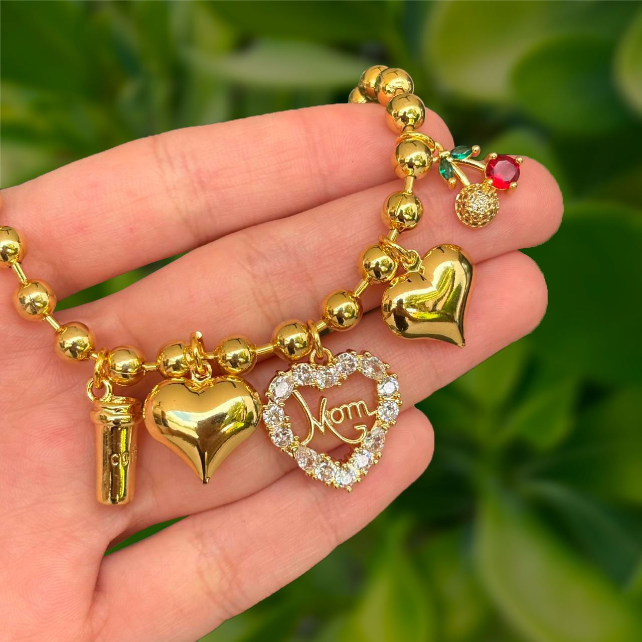 Pulsera Dorada Bolitas y Charms