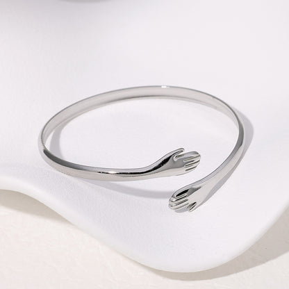 Pulsera Plateada Abrazo Acero Inoxidable  1s2