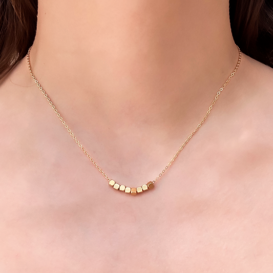 Collar Cubitos Dorados Acero Inoxidable 3L1