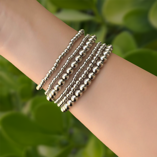 Set Pulseras Bolitas Plateadas Chapa de Oro  2BB3