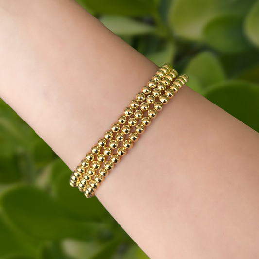 Pulsera de 3 piezas Doradas Trenzadas Bolitas  1Y2