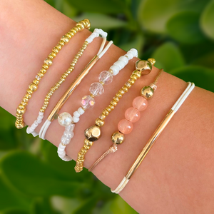 Set 6 pulseras Blancas y Doradas 1xx1