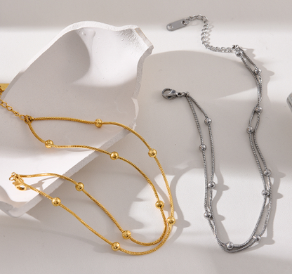 Tobillera Doble Dorada Acero de Titaio  2C4