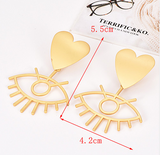 Aretes Corazon Ojo Dorado 2T1
